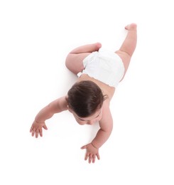 Photo of Cute little baby crawling on white background, above view