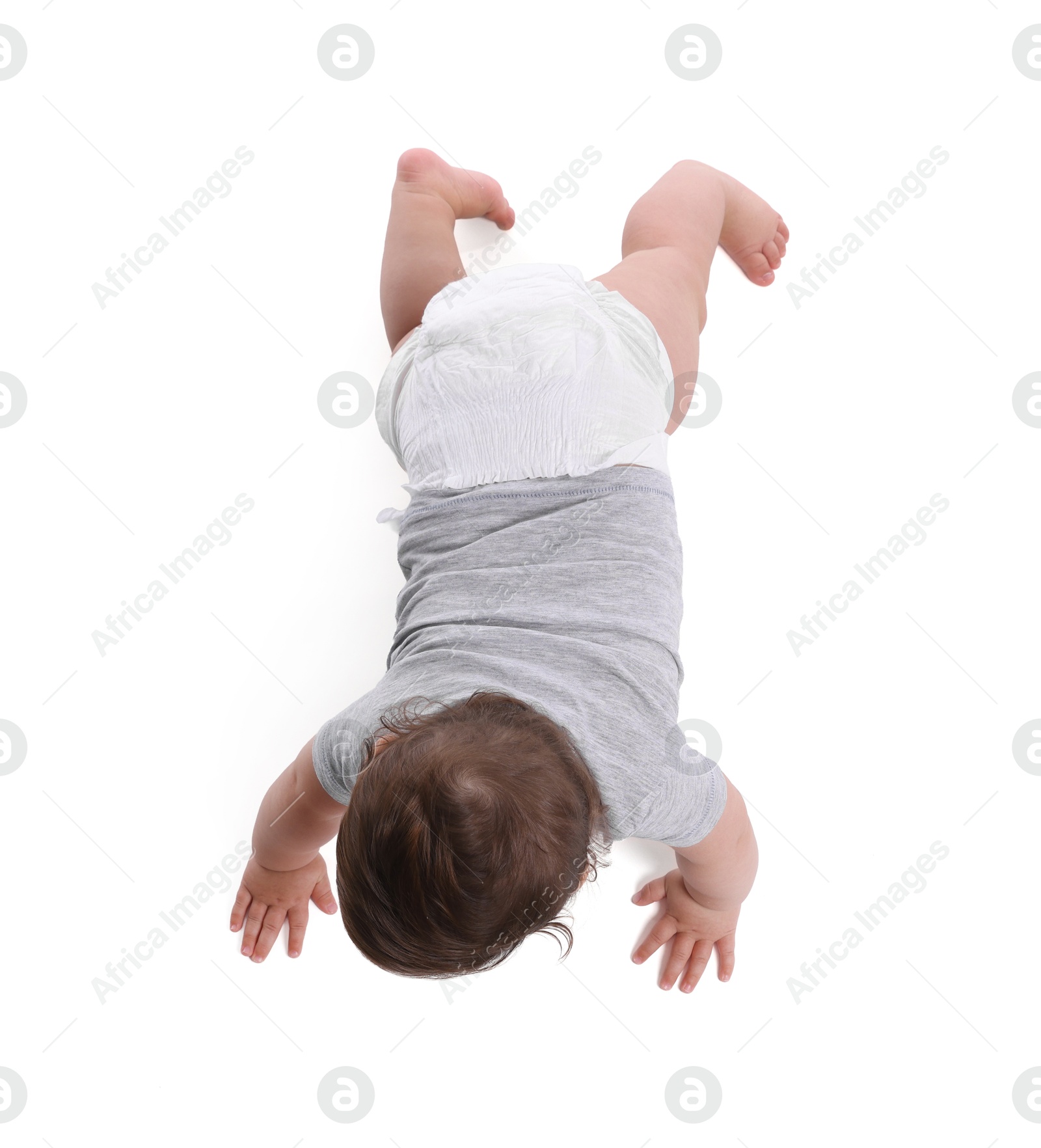 Cute little baby crawling on white background, above view Photo of Cute little baby crawling on white background, above view