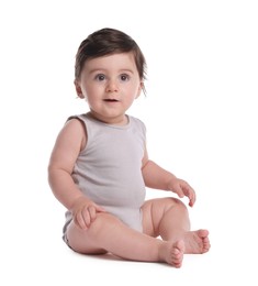 Photo of Cute little baby sitting on white background