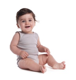 Photo of Cute little baby sitting on white background