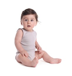 Photo of Cute little baby sitting on white background