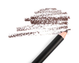 Photo of Eyebrow pencil and strokes isolated on white, top view