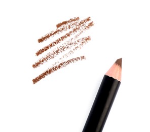Photo of Eyebrow pencil and strokes isolated on white, top view