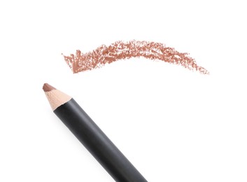 Photo of Eyebrow pencil and strokes isolated on white, top view