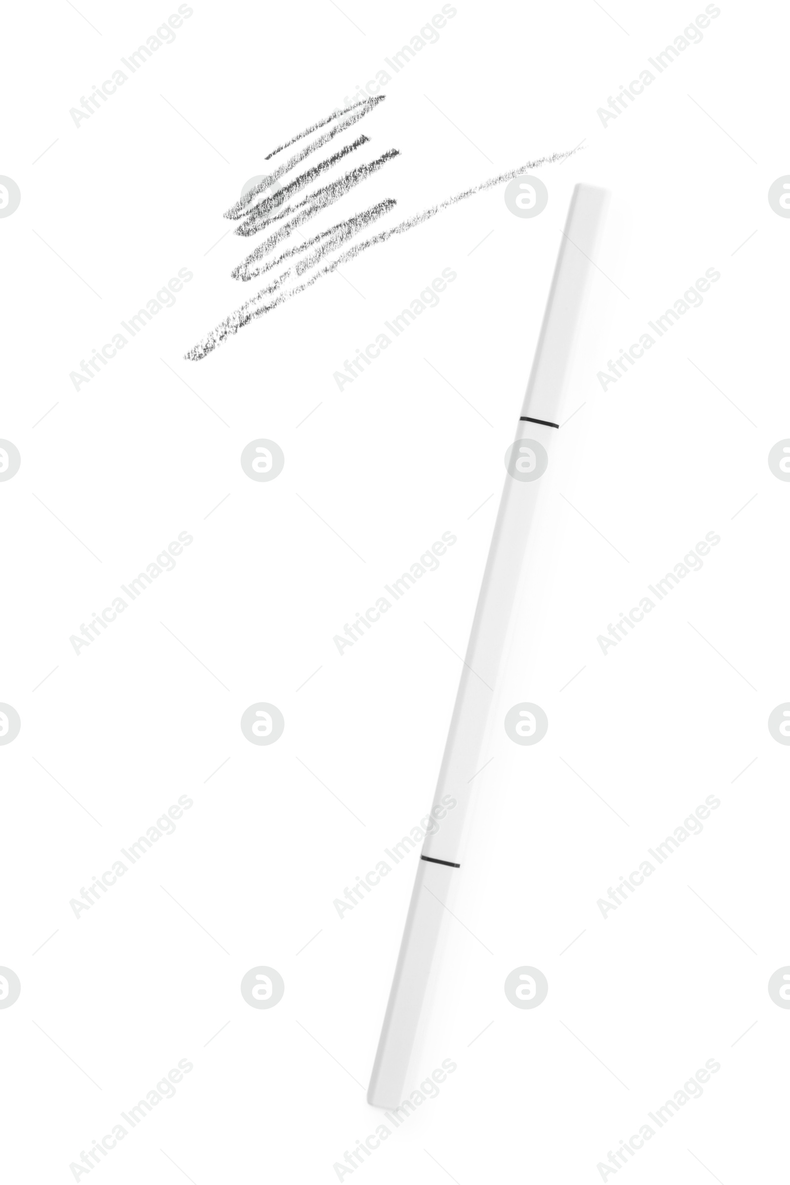 One eyebrow pencil and strokes isolated on white, top view Photo of One eyebrow pencil and strokes isolated on white, top view
