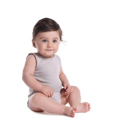 Photo of Cute little baby sitting on white background