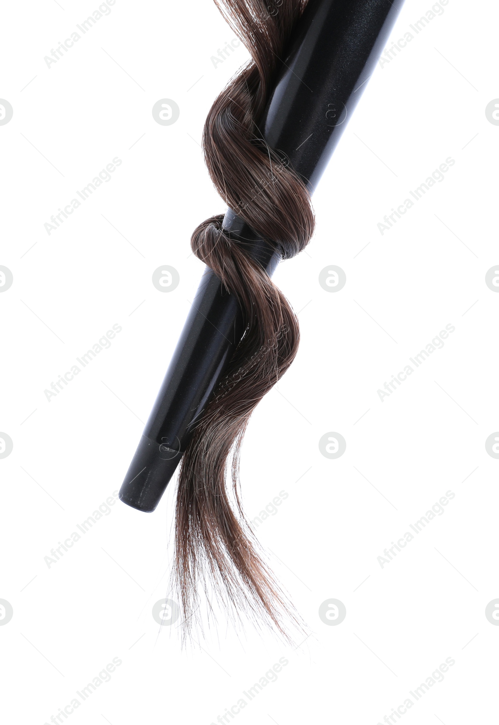 Curling iron with brown hair lock isolated on white Photo of Curling iron with brown hair lock isolated on white