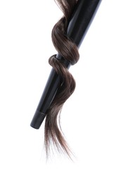 Photo of Curling iron with brown hair lock isolated on white
