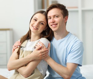 Photo of Portrait of happy couple after apology at home