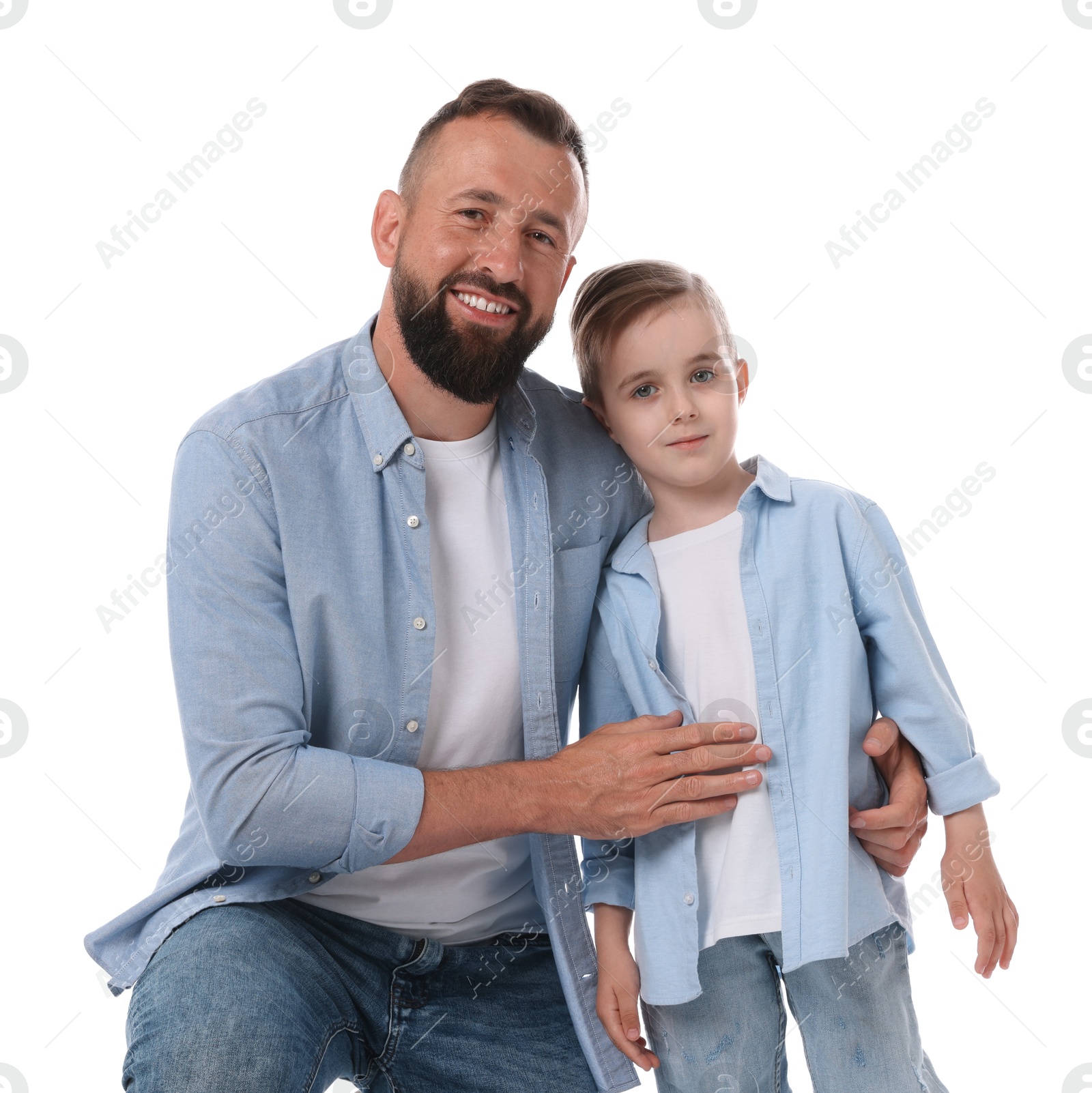 Family portrait of smiling dad and his son on white background Photo of Family portrait of smiling dad and his son on white background
