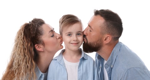 Photo of Family. Parents kissing their happy son on white background