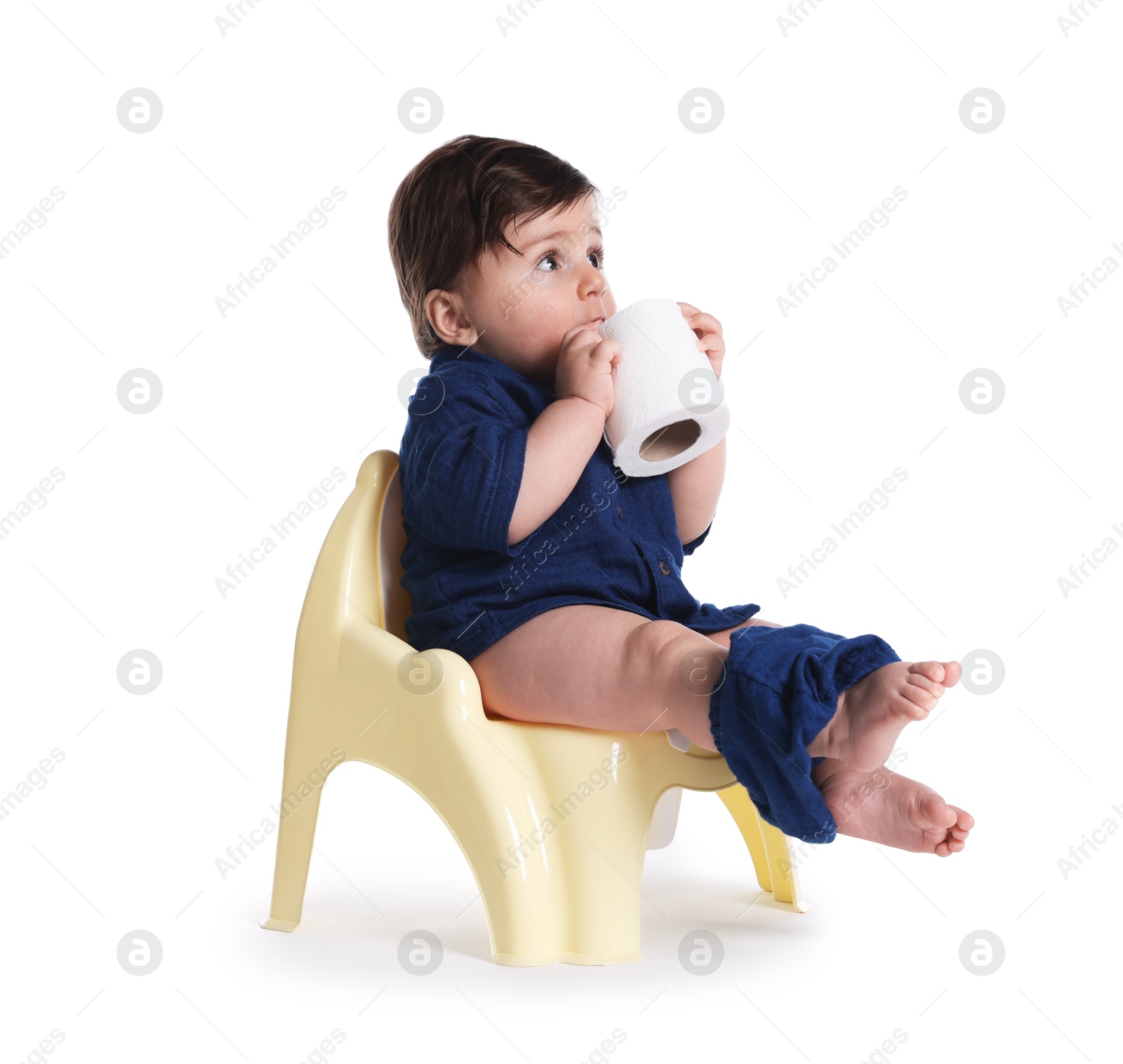 Cute little baby sitting on potty with toilet paper against white background Photo of Cute little baby sitting on potty with toilet paper against white background