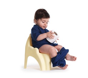 Photo of Cute little baby sitting on potty with toilet paper against white background