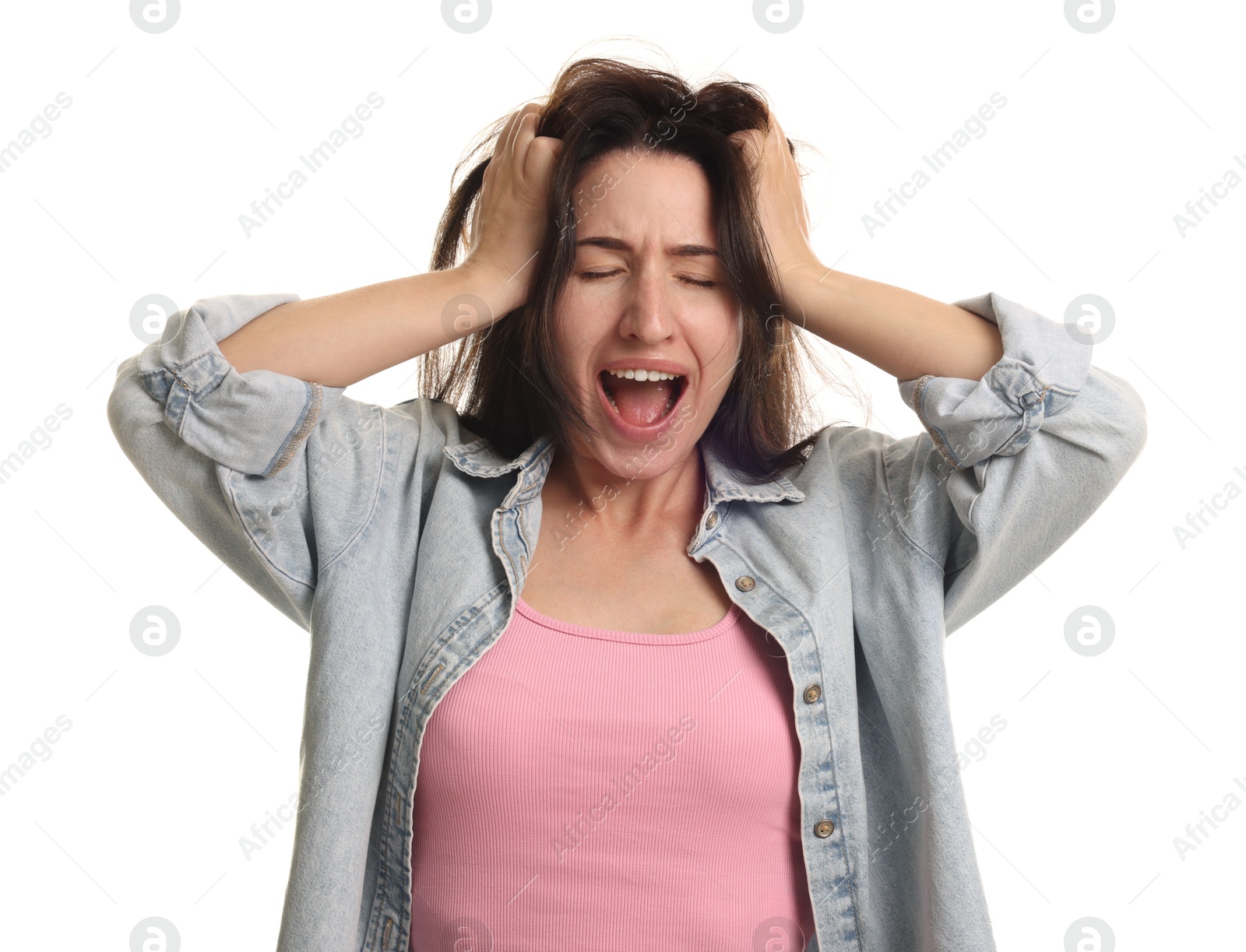 Photo of Emotional woman suffering from panic attack on white background