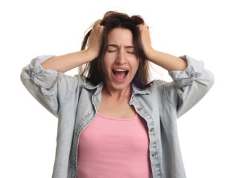 Photo of Emotional woman suffering from panic attack on white background