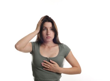 Photo of Woman suffering from panic attack on white background