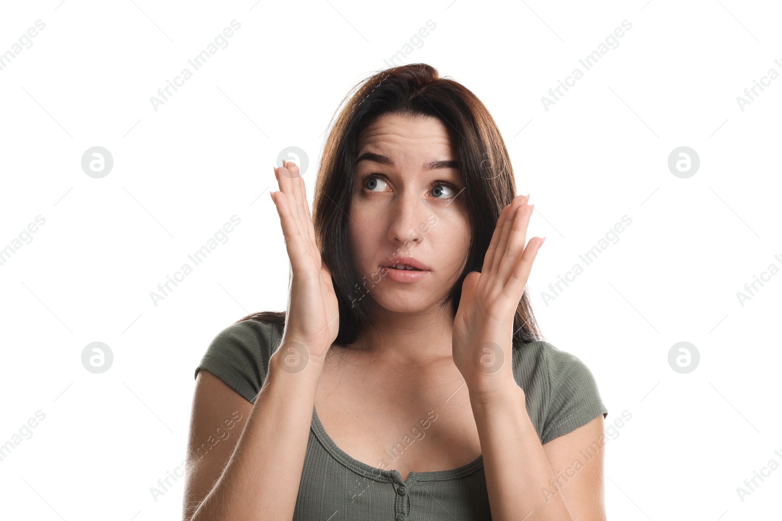 Woman suffering from panic attack on white background Photo of Woman suffering from panic attack on white background