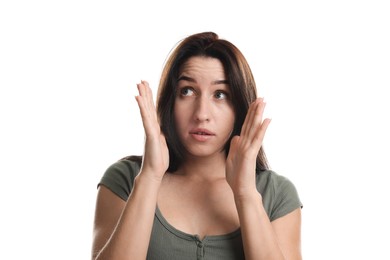 Photo of Woman suffering from panic attack on white background