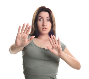 Photo of Woman suffering from panic attack on white background