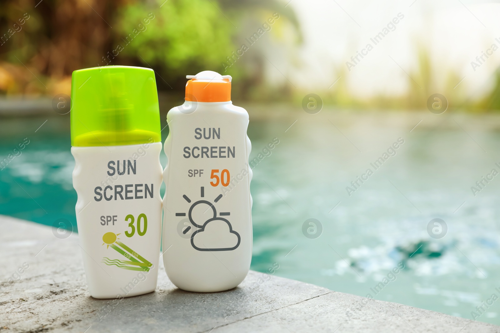 Sunscreens in bottles on swimming pool edge. Sun protection product Image of Sunscreens in bottles on swimming pool edge. Sun protection product