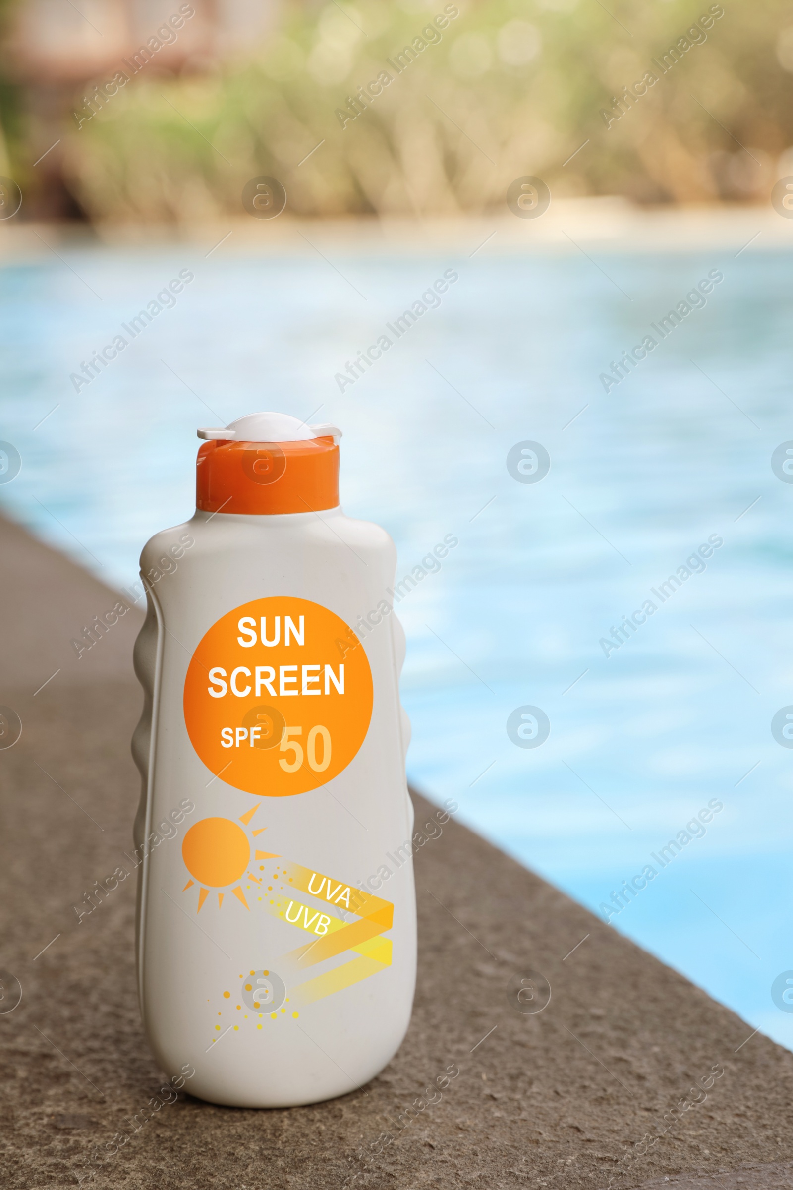 Sunscreen in bottle on swimming pool edge. Sun protection product Image of Sunscreen in bottle on swimming pool edge. Sun protection product