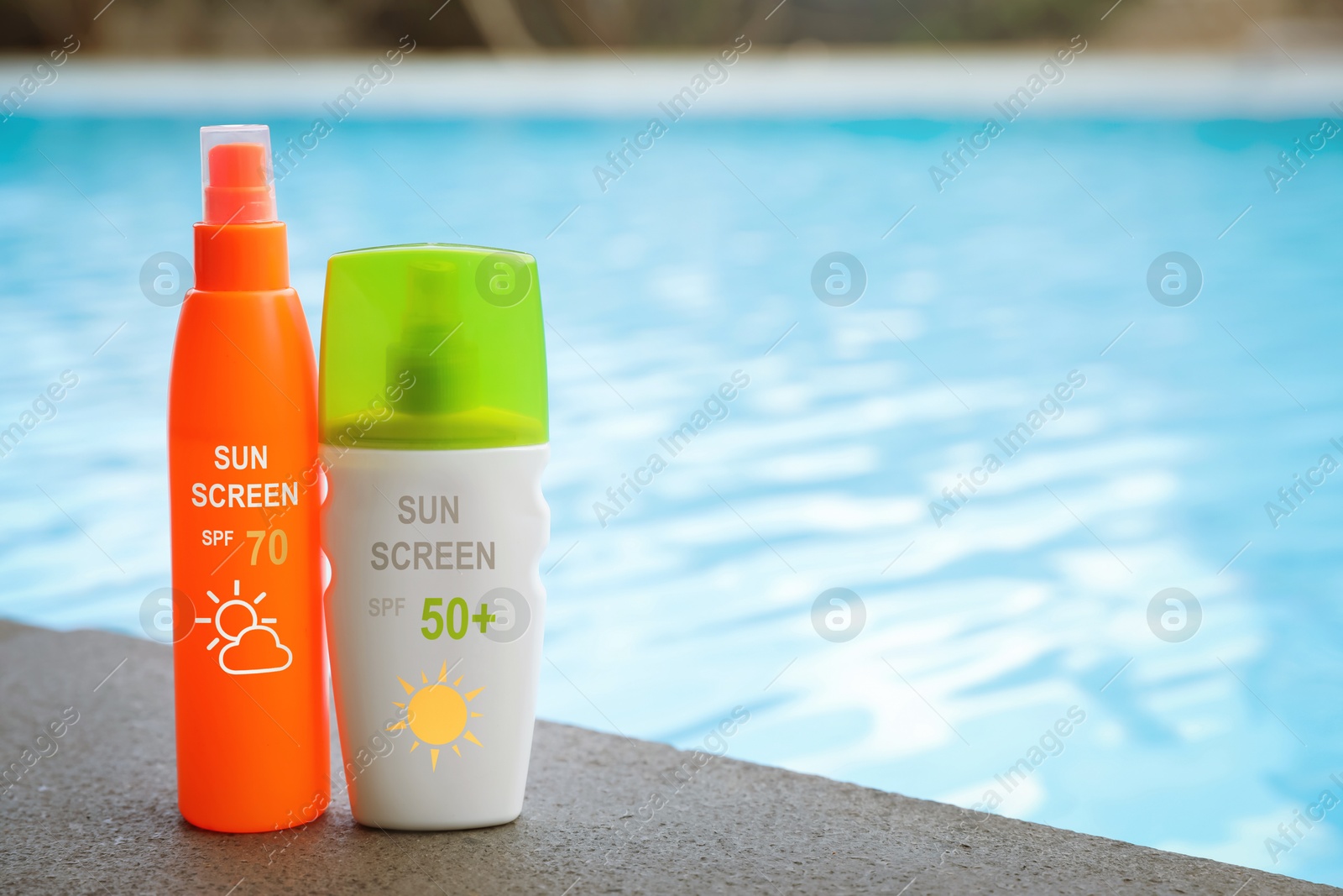Sunscreens in bottles on swimming pool edge. Sun protection product Image of Sunscreens in bottles on swimming pool edge. Sun protection product