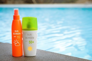 Image of Sunscreens in bottles on swimming pool edge. Sun protection product