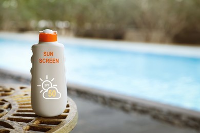 Image of Sunscreen in bottle near swimming pool. Sun protection product