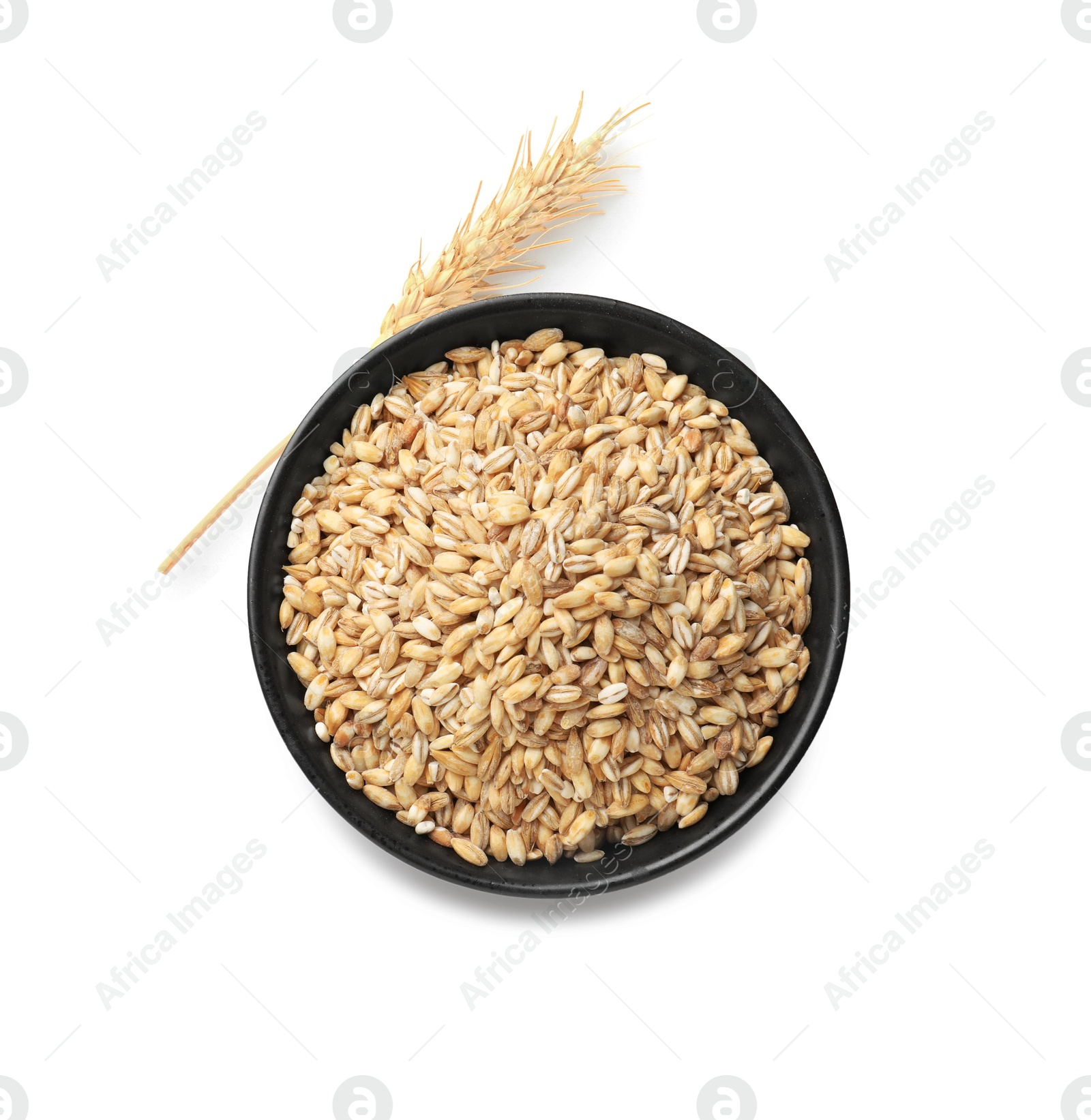 Image of Wheat grains in bowl and spikelet on white background, top view