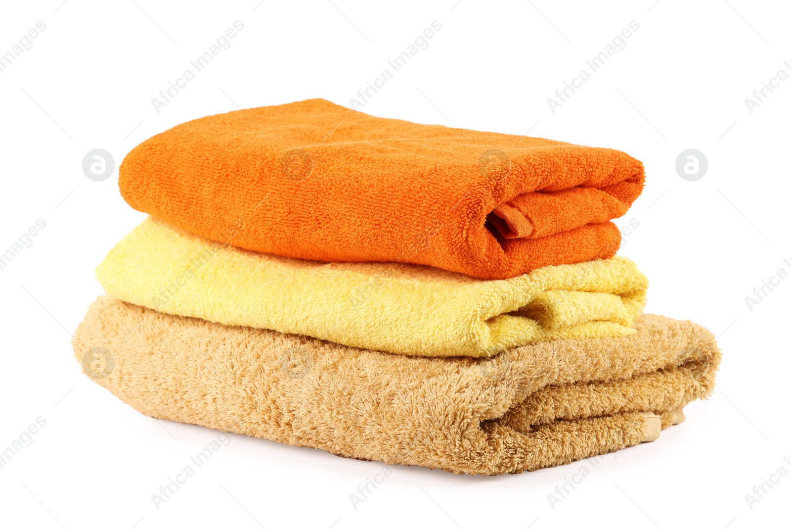 Photo of Stack of soft towels isolated on white