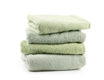 Photo of Stack of soft green towels isolated on white