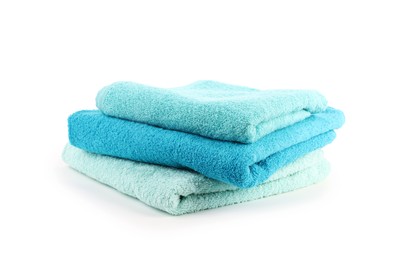 Photo of Stack of soft towels isolated on white