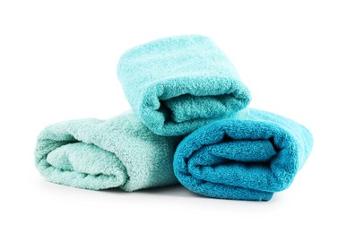 Photo of Rolled towels isolated on white. Home textile