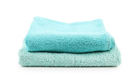 Photo of Stack of soft towels isolated on white