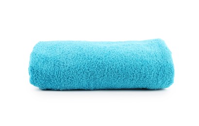 Photo of One rolled blue towel isolated on white