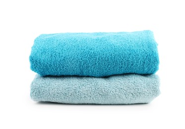 Photo of Stack of soft towels isolated on white