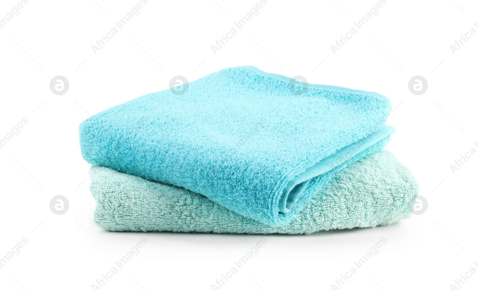Stack of soft towels isolated on white Photo of Stack of soft towels isolated on white