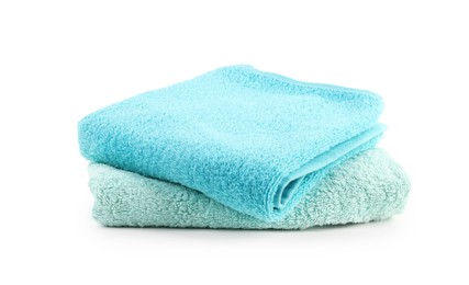 Photo of Stack of soft towels isolated on white