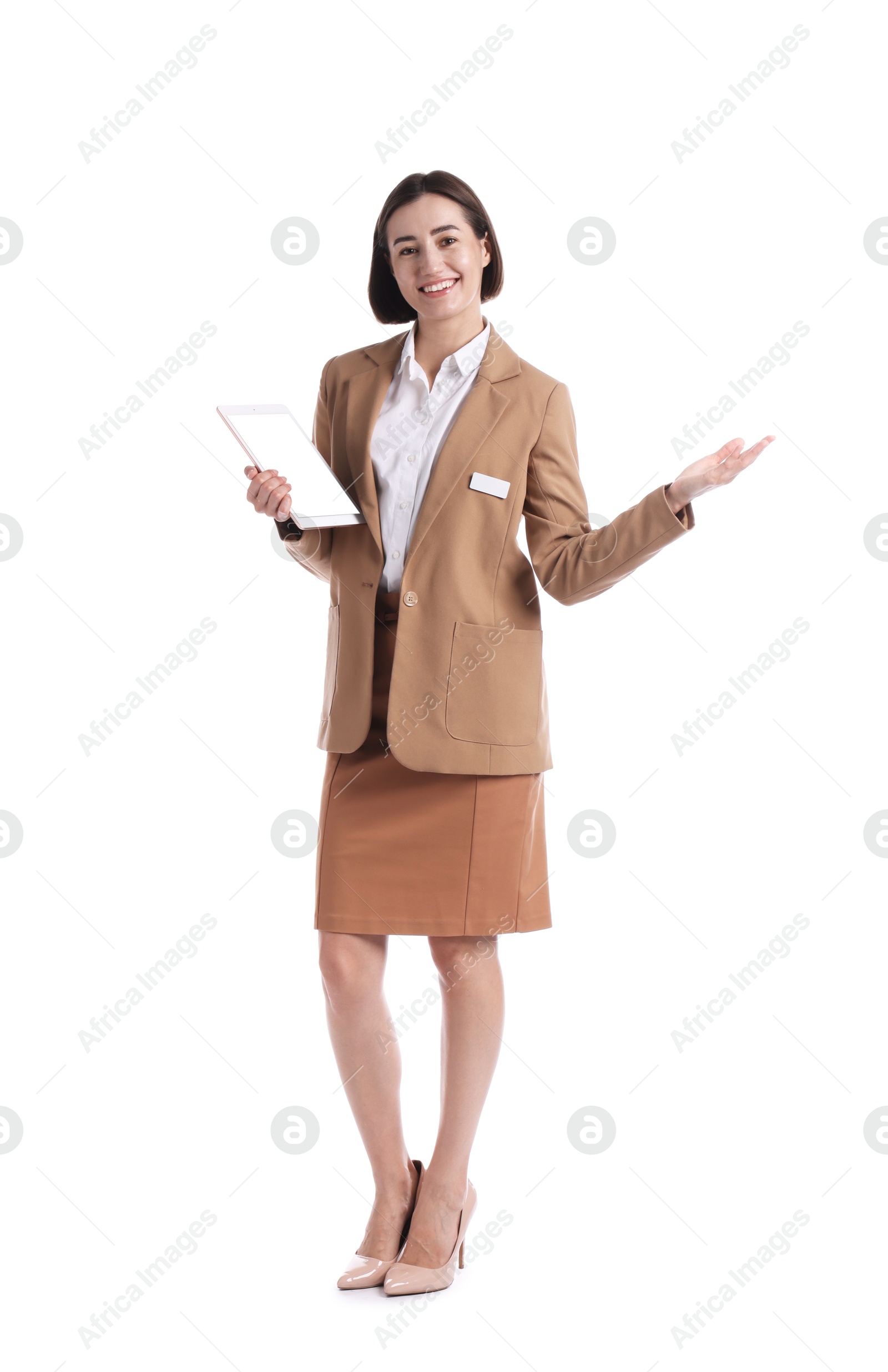 Smiling hostess in uniform with tablet on white background Photo of Smiling hostess in uniform with tablet on white background
