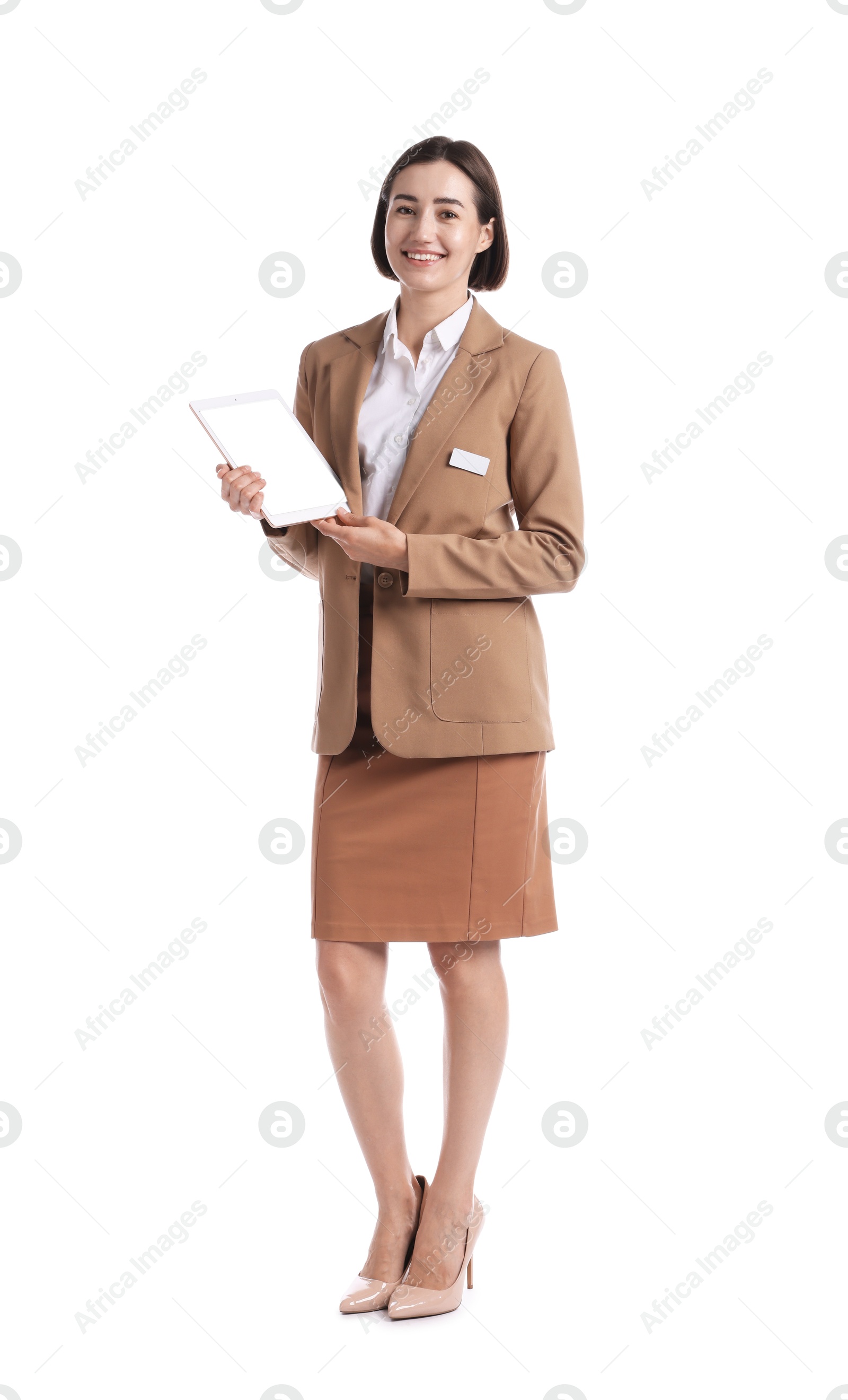 Smiling hostess in uniform with tablet on white background Photo of Smiling hostess in uniform with tablet on white background