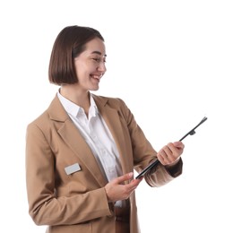 Photo of Smiling hostess in uniform with clipboard on white background