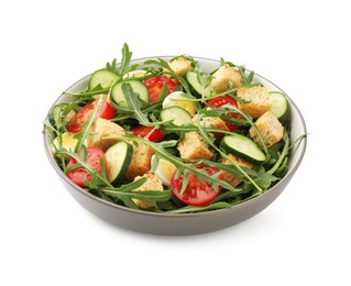 Photo of Tasty salad with croutons, cucumbers, tomatoes and arugula isolated on white