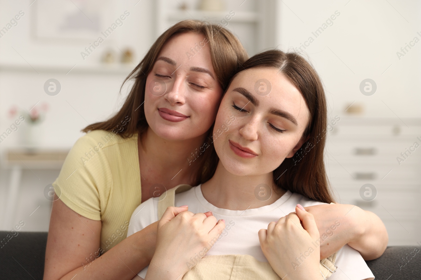 Photo of Happy friends together after apology at home