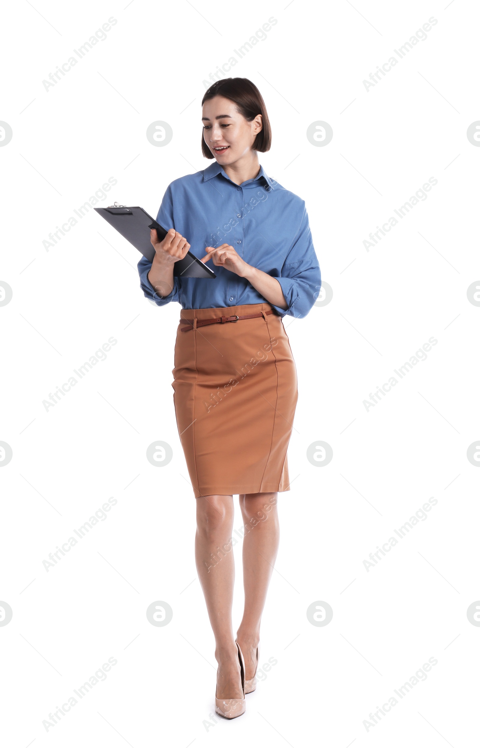 Smiling hostess in uniform with clipboard on white background Photo of Smiling hostess in uniform with clipboard on white background