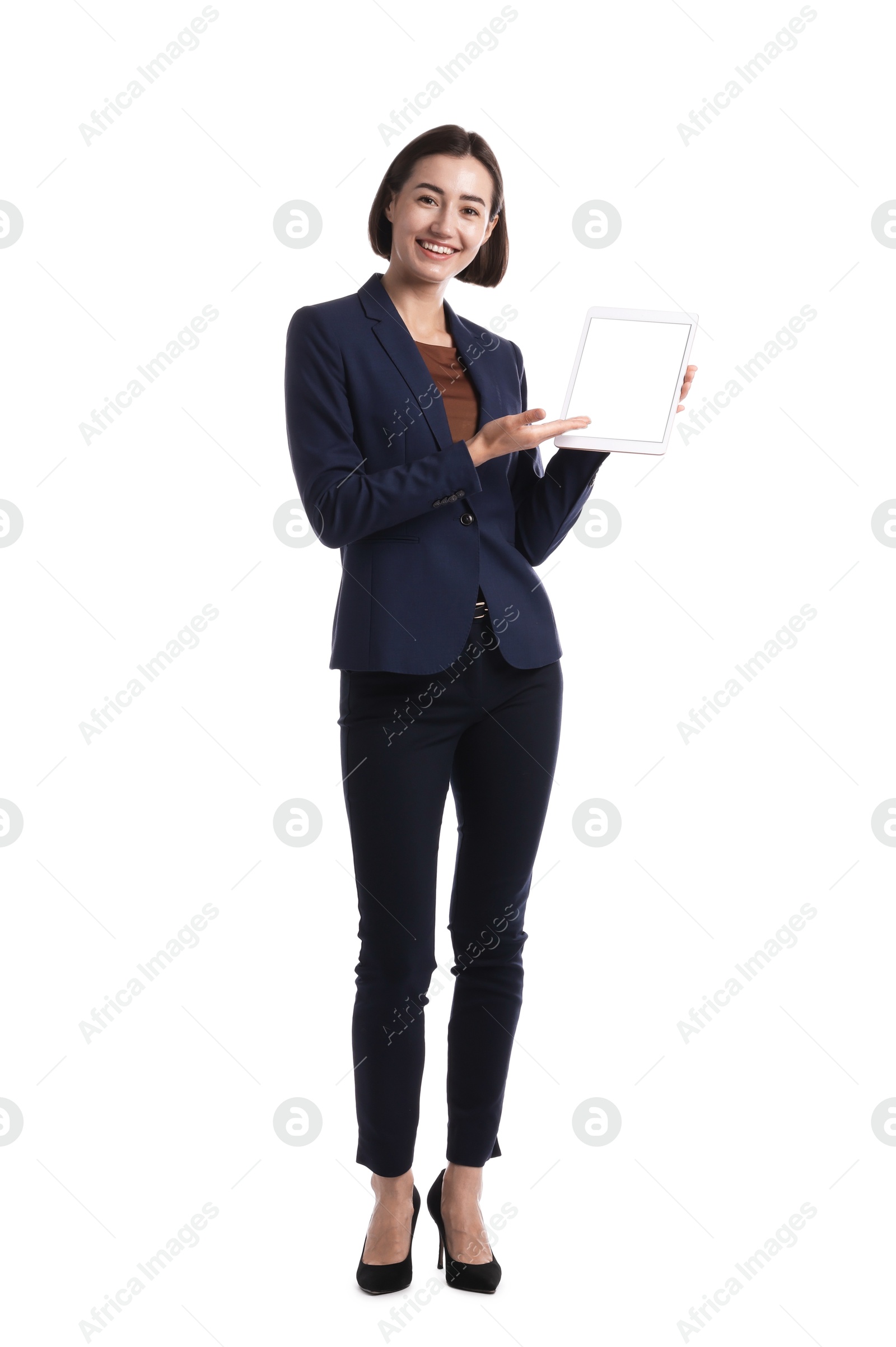 Smiling hostess in uniform with tablet on white background Photo of Smiling hostess in uniform with tablet on white background