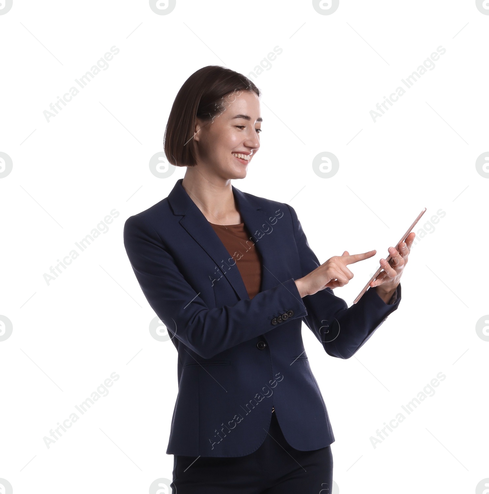 Smiling hostess in uniform using tablet on white background Photo of Smiling hostess in uniform using tablet on white background
