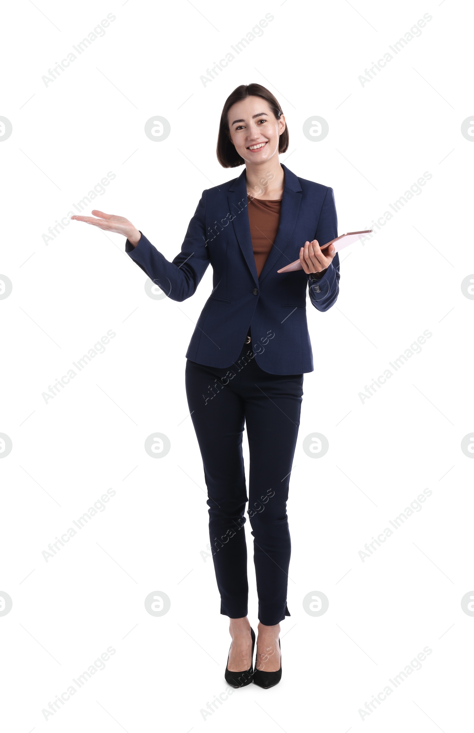 Smiling hostess in uniform with tablet on white background Photo of Smiling hostess in uniform with tablet on white background