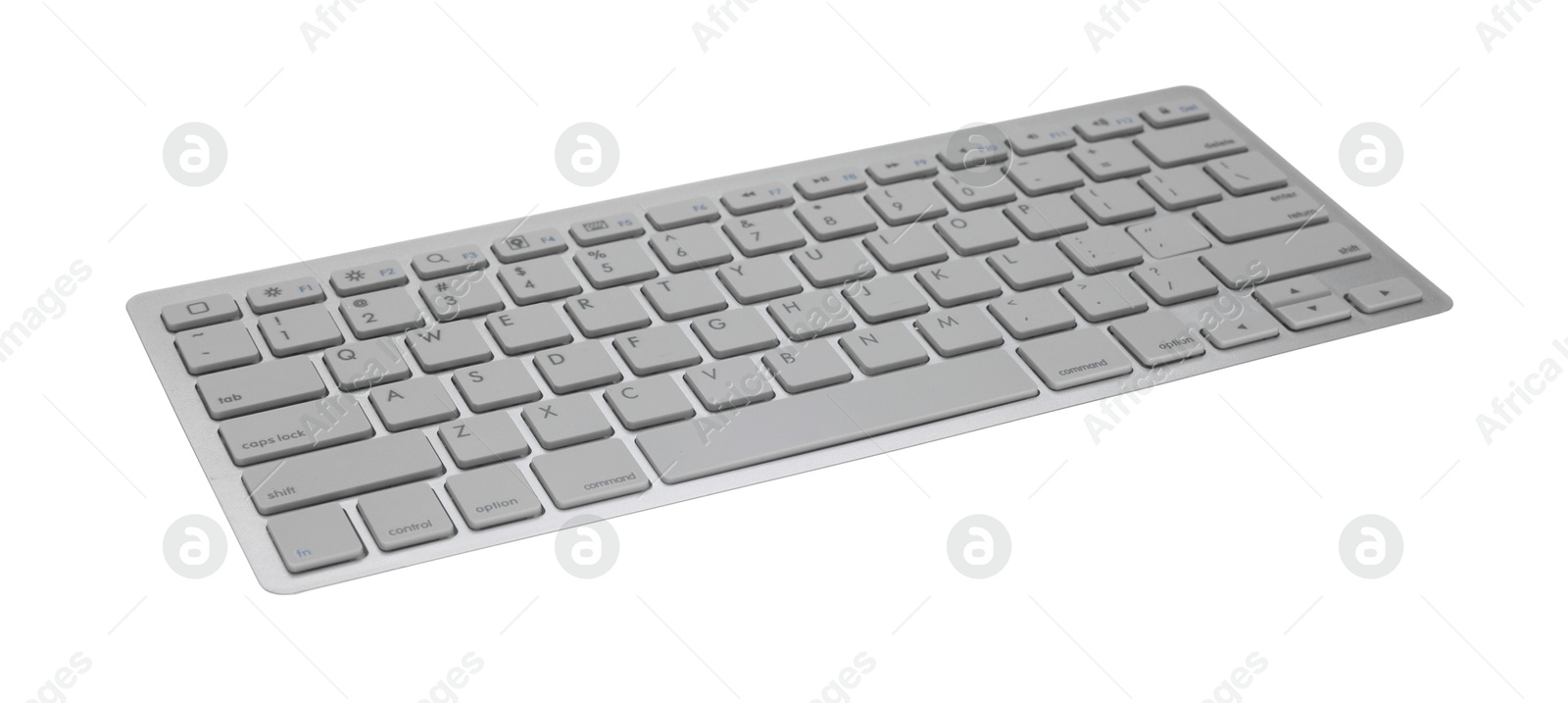 Photo of Modern wireless computer keyboard isolated on white
