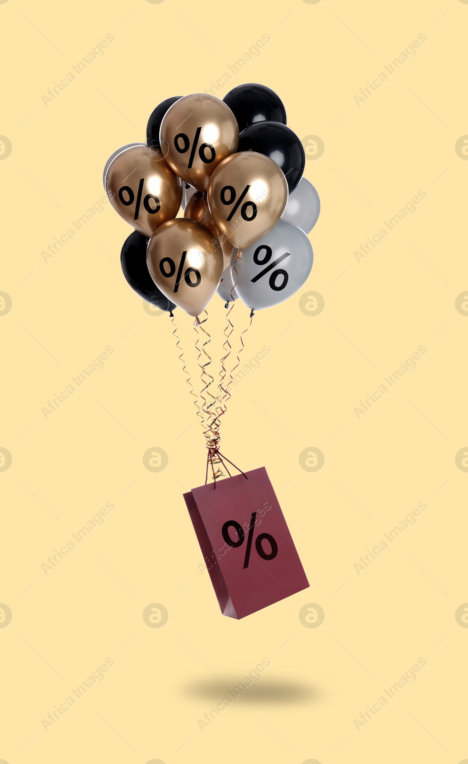 Image of Hot sale, special offer. Shopping bag and balloons with percent signs in air against beige background