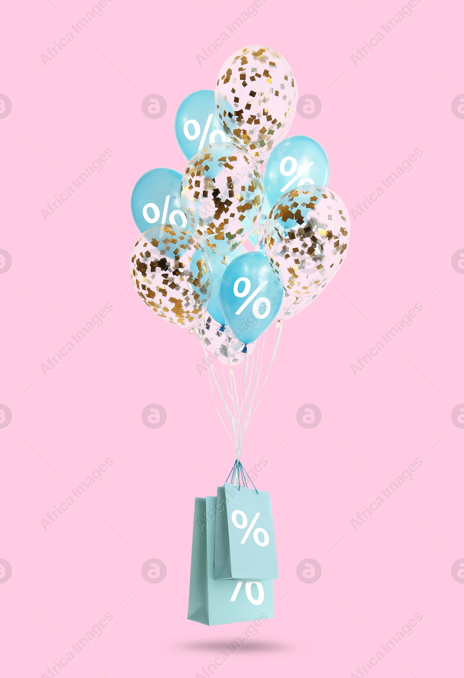 Hot sale, special offer. Shopping bags and balloons with percent signs in air against pink background Image of Hot sale, special offer. Shopping bags and balloons with percent signs in air against pink background